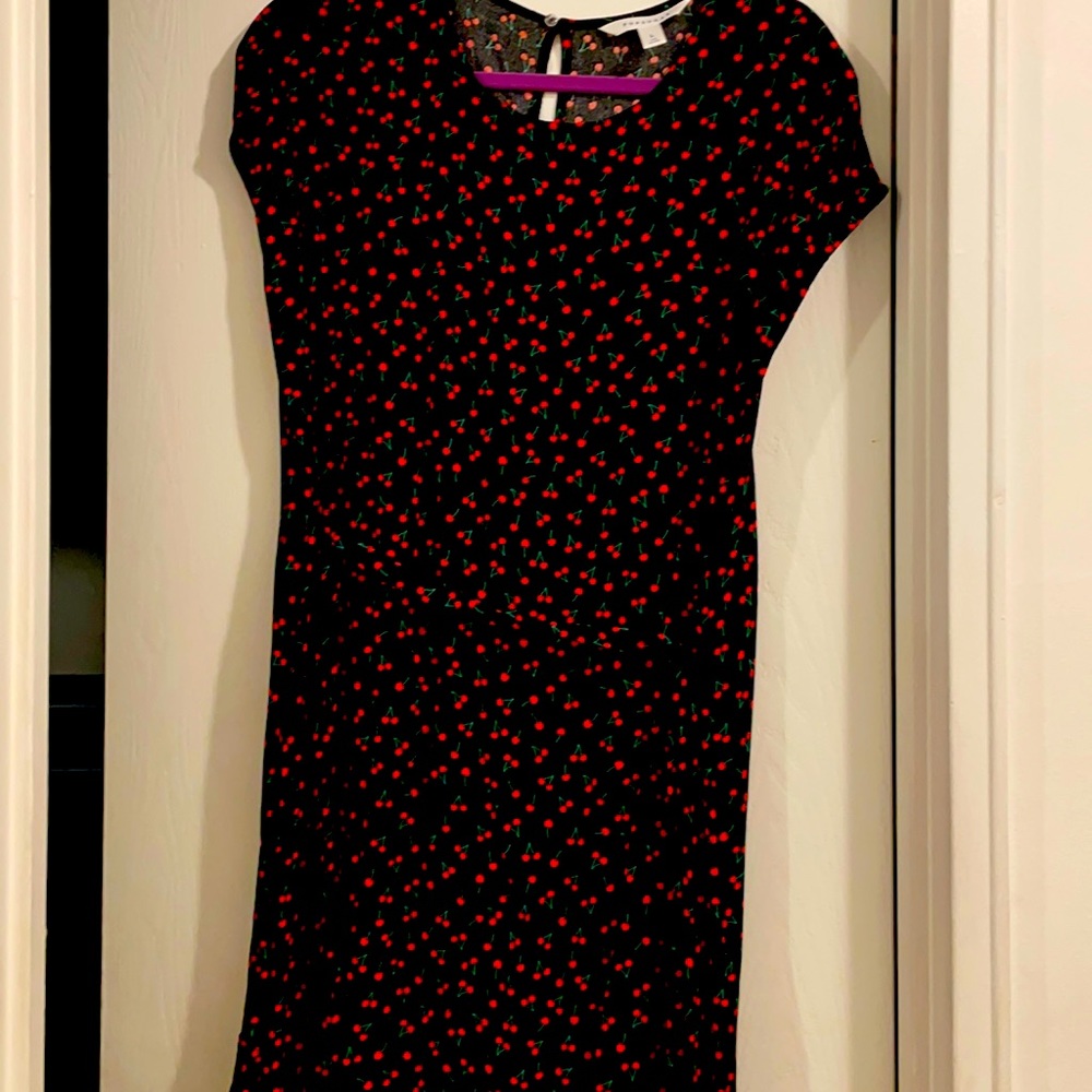Black dress with little cherry’s and a tie belt